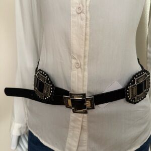 Black PU leather silver tone concho style skinny belt